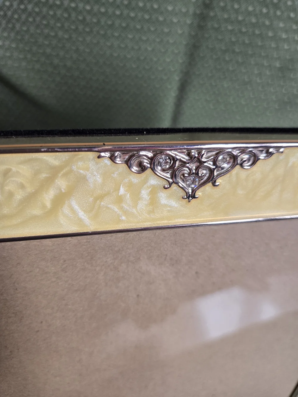 Elegant Yellow Gold Faux Marble Design with Silver Accent Scrolls Phone Frame